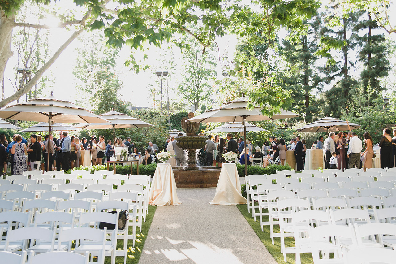 A wedding ceremony near a fountain
