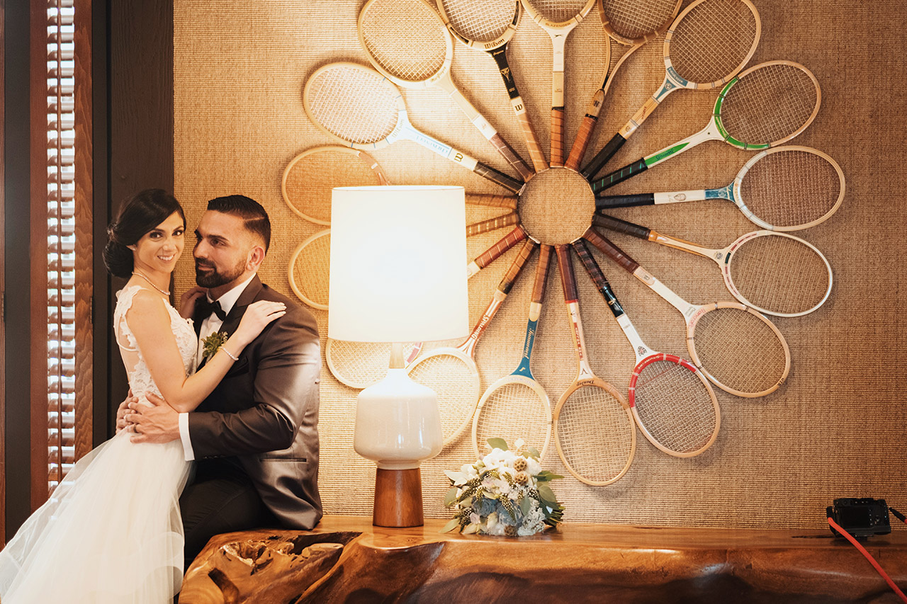 A couple posing in the hotel lobby