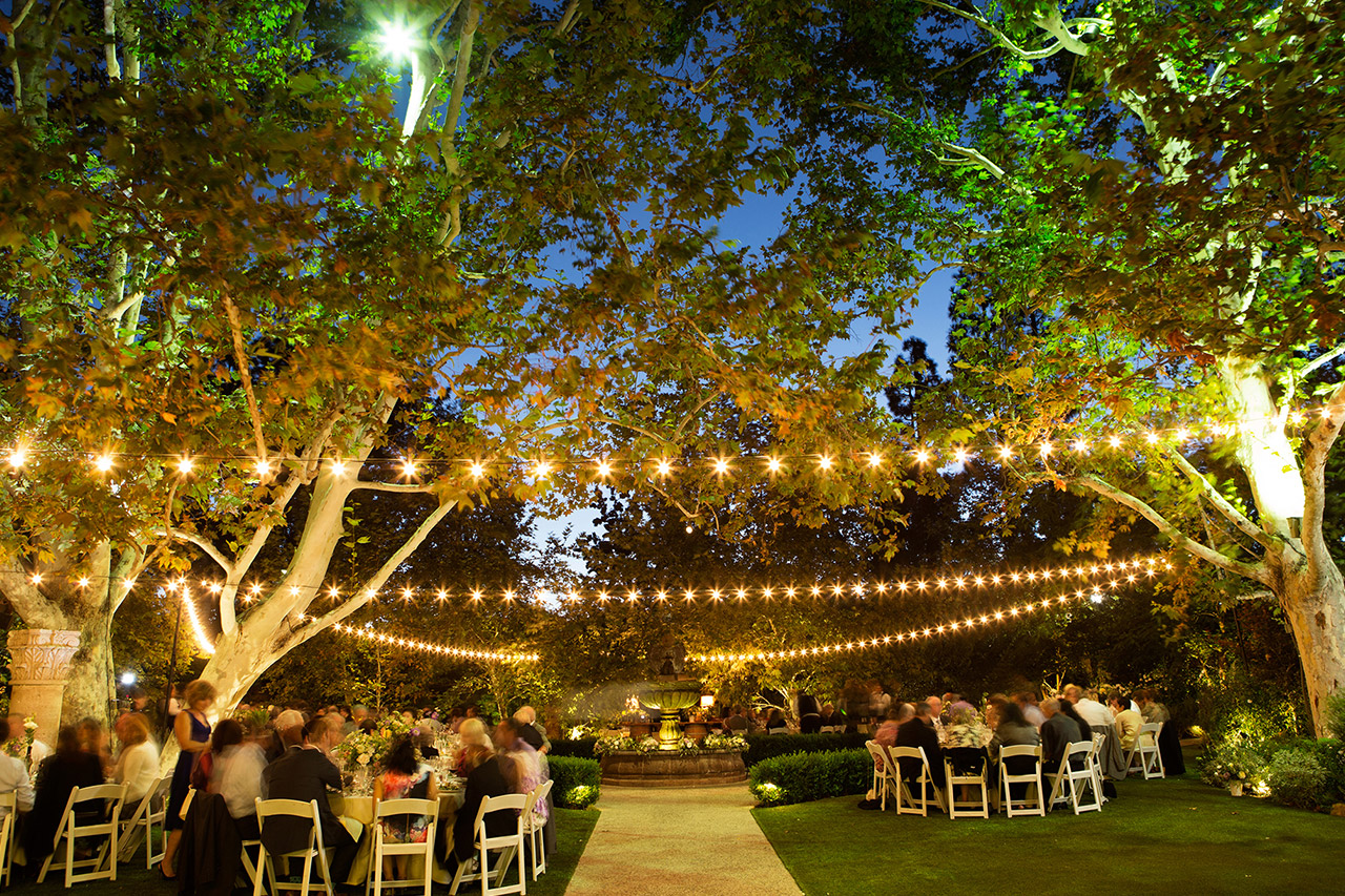 An evening outdoor wedding reception