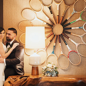 A couple posing in the hotel lobby