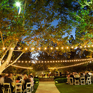 An evening outdoor wedding reception