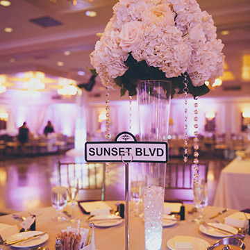 A table centerpiece reading Sunset Blvd